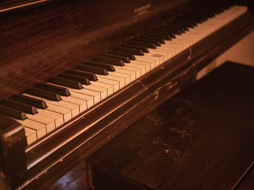 piano closeup photo of upright piano musical instrument